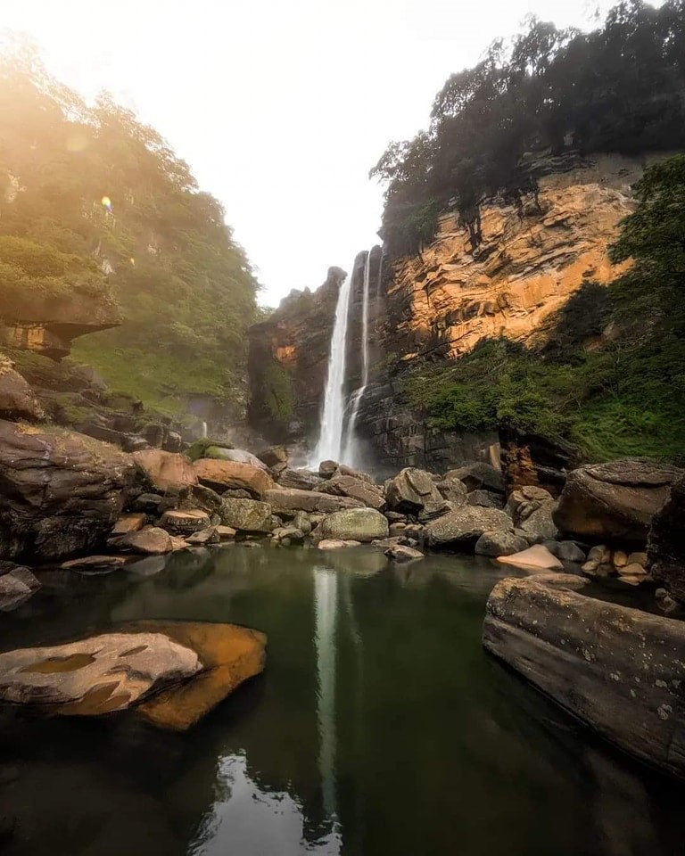 Waterfall in-between Cliff